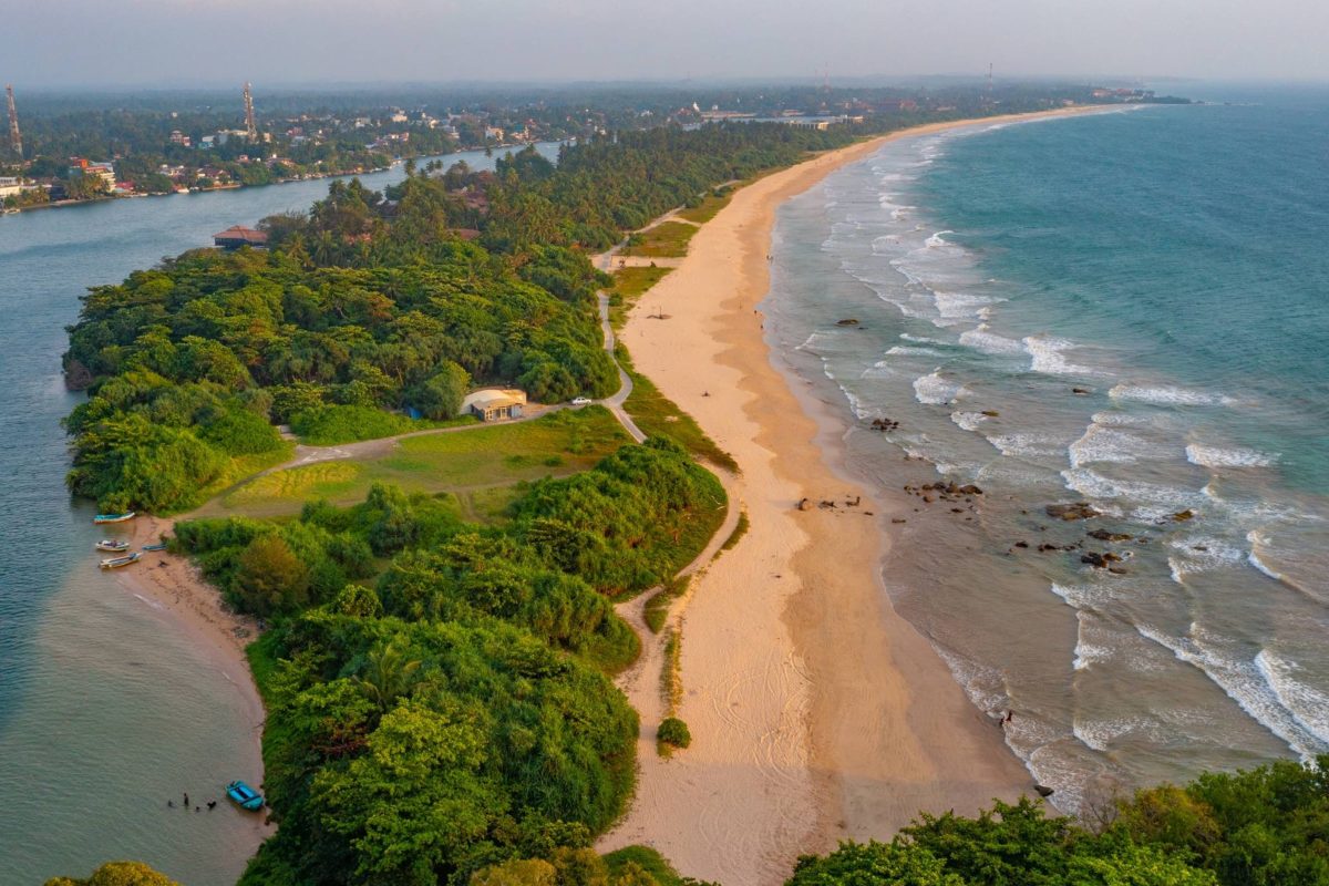 Aerial view of surfers near Hikkaduwa beach. Hikkaduwa, Sri Lanka.